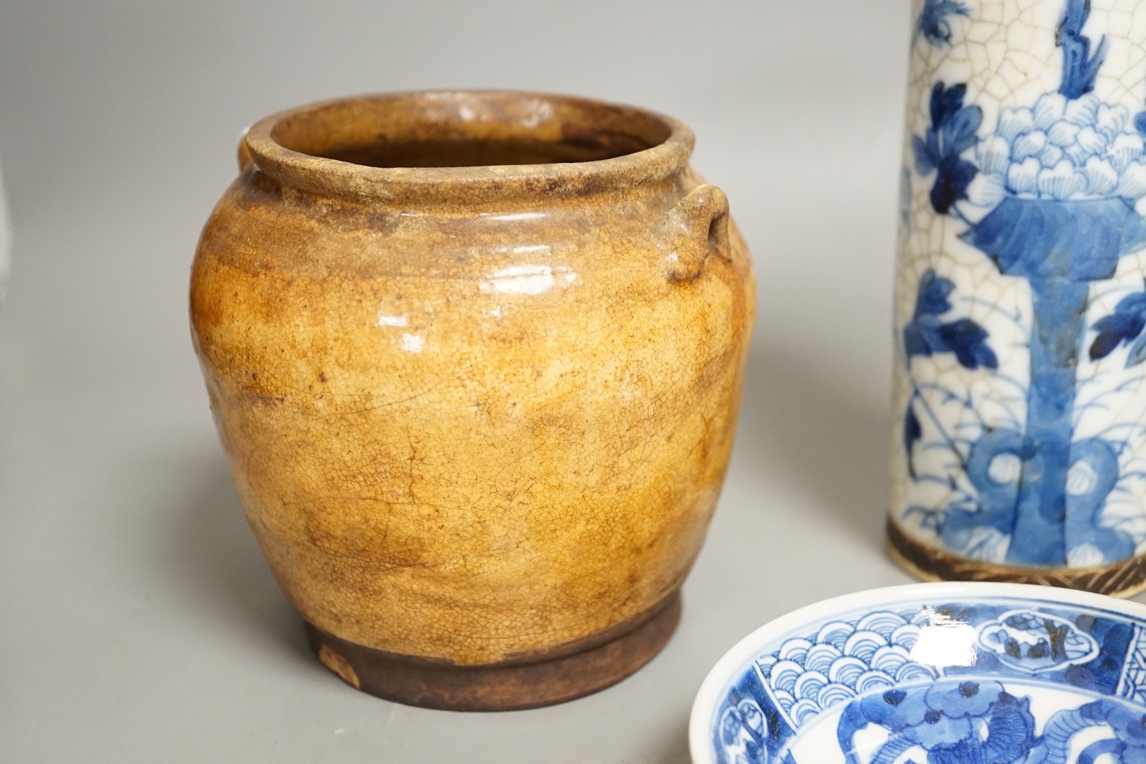 A Chinese crackle glaze blue and white sleeve vase, 20cm high, similar dish and pottery vessel